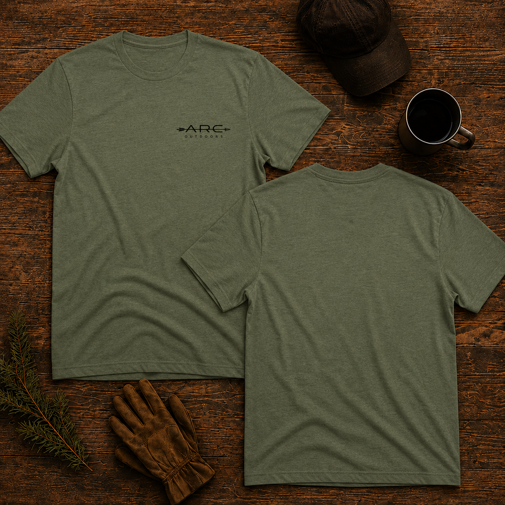 Front and back flat lay of field olive ARC Outdoors tee on rustic wood surface